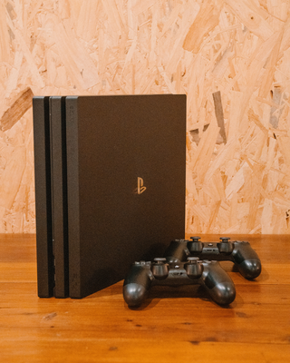 PlayStation 4 Pro Console with DualShock 4 Controllers