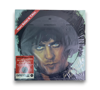 Zinc Alloy And The Hidden Riders Of Tomorrow / A Creamed Cage In August