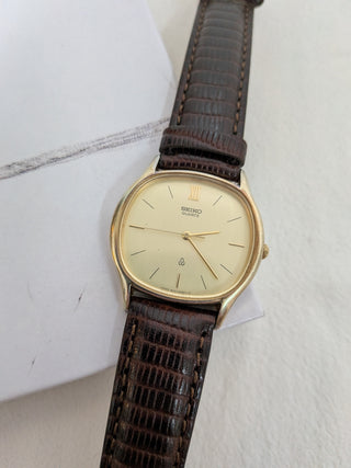Vintage Seiko Quartz Gold-Tone Round Watch with Brown Leather Strap