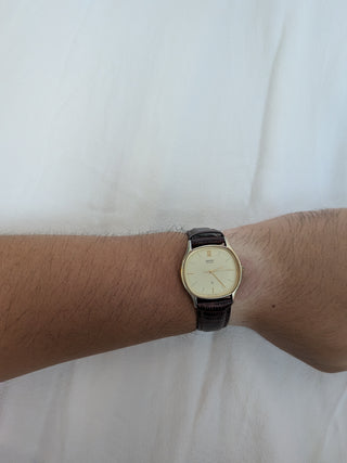 Vintage Seiko Quartz Gold-Tone Round Watch with Brown Leather Strap