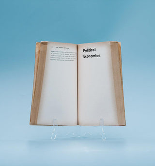 Between Capitalism and Socialism: Essays in political economics - Thryft